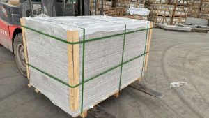 Granite kerbs wrapped on a pallet before loading