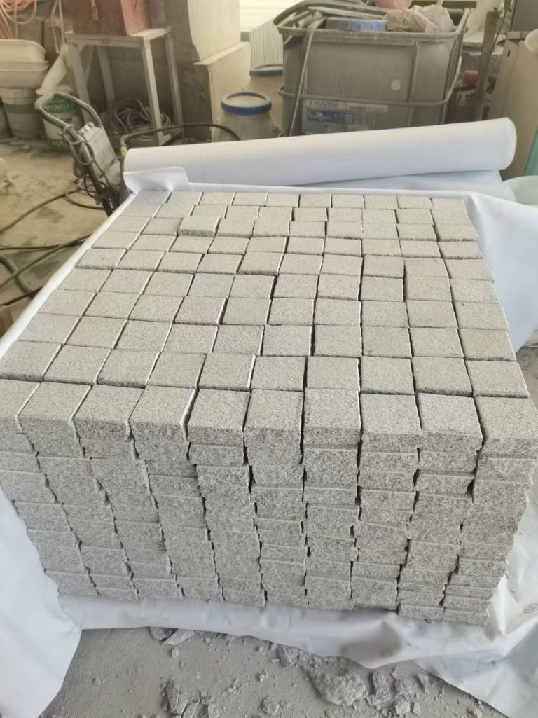 Granite setts stacked after a flamed finish