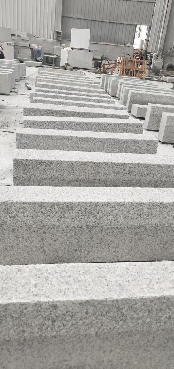 Thick granite slabs stacked at the yard